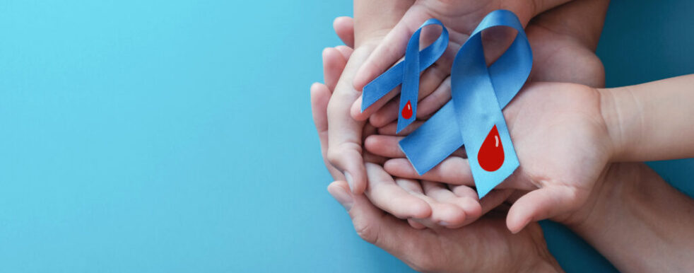 Light blue ribbons with blood on blue background , world diabetes day Light blue ribbons with blood on blue background , world diabetes day